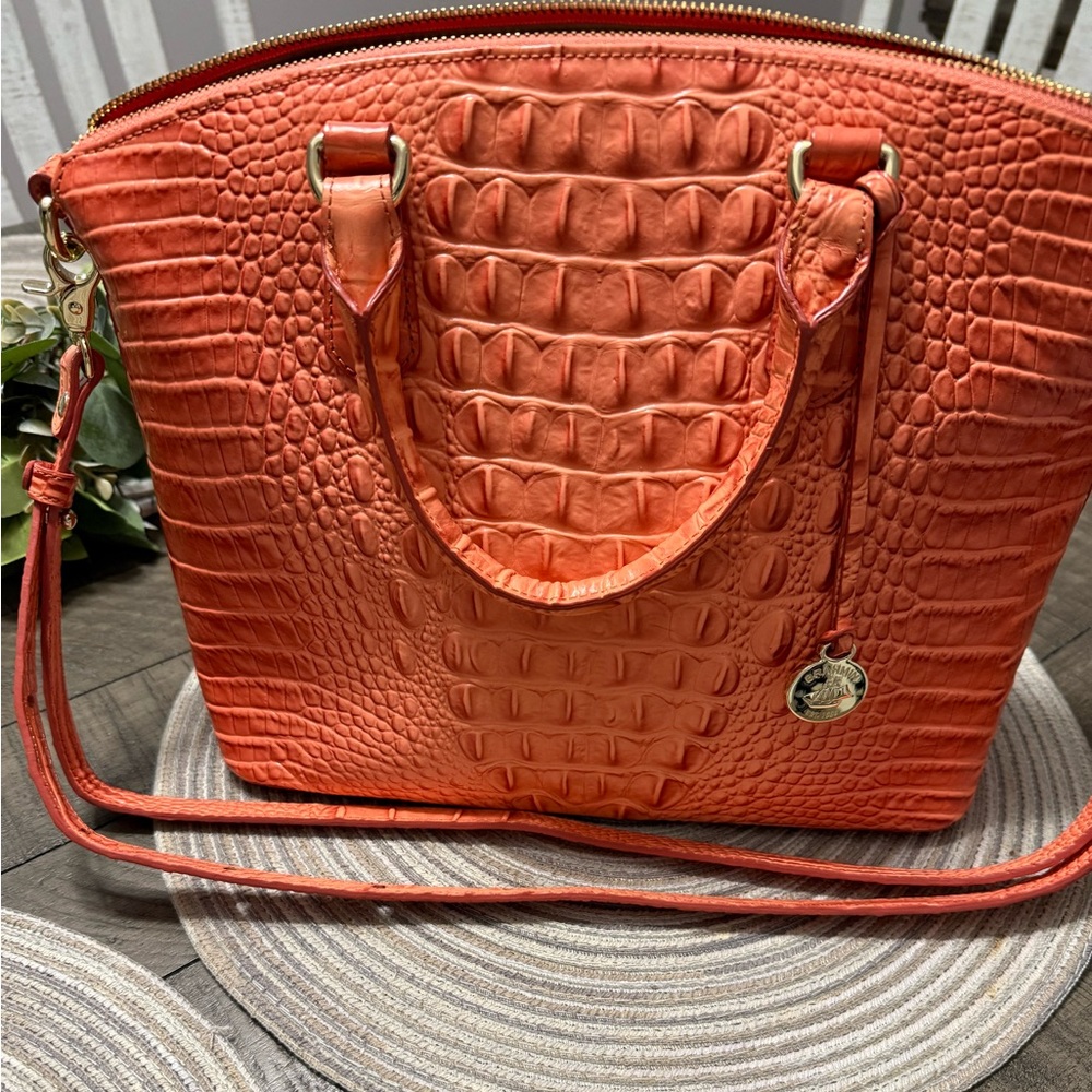 Brahmin Duxbury satchel in a dusty orange crocodile-embossed leather.